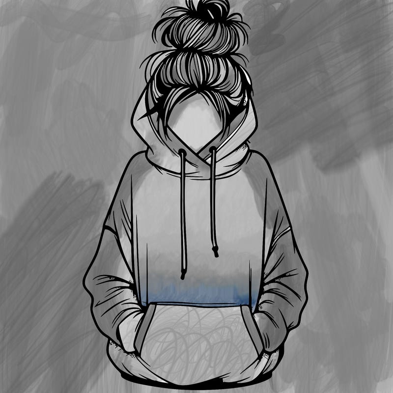 girl with messy bun and an oversized hoodie