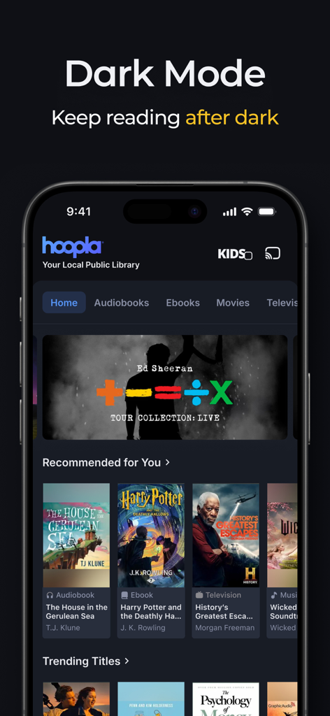 Hoopla Digital app interface showing the Dark Mode feature with a selection of eBooks and audiobooks on a smartphone screen.