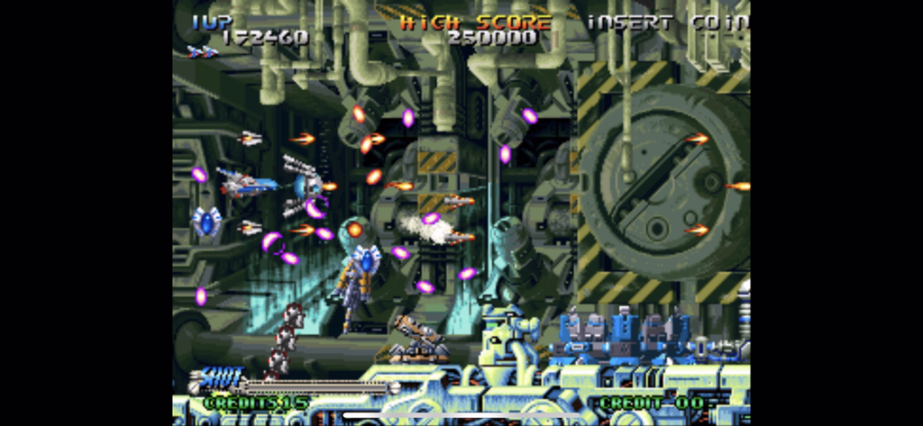 Capture d'écran du jeu de tir à défilement horizontal Blazing Star montrant un vaisseau spatial dans un niveau d'arcade industriel