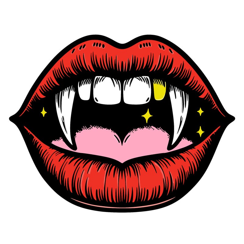 lips with vampire teeth