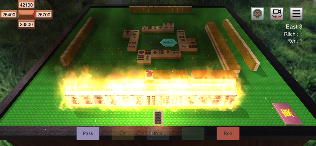 Riichi Mahjong gameplay showing a winning hand with fire effects and the Ron action button.