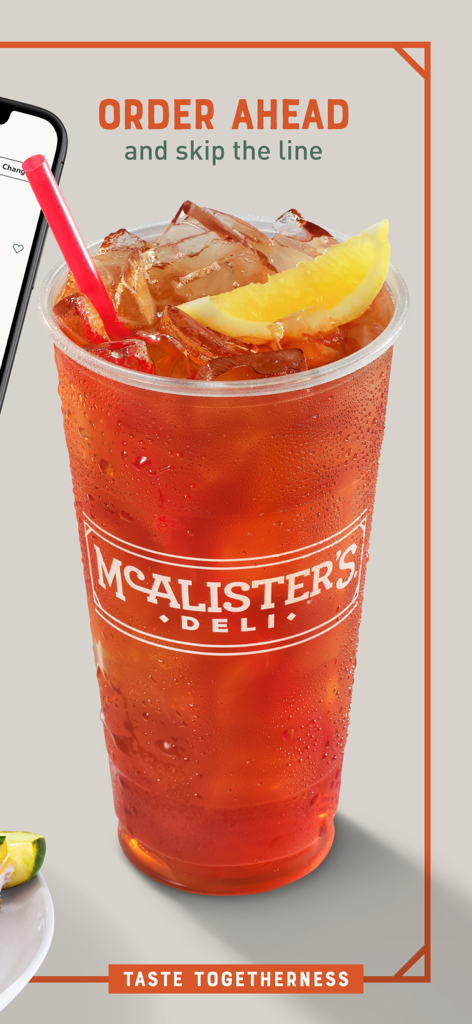 A large McAlister's Deli iced tea with a lemon wedge and straw featuring an order ahead message