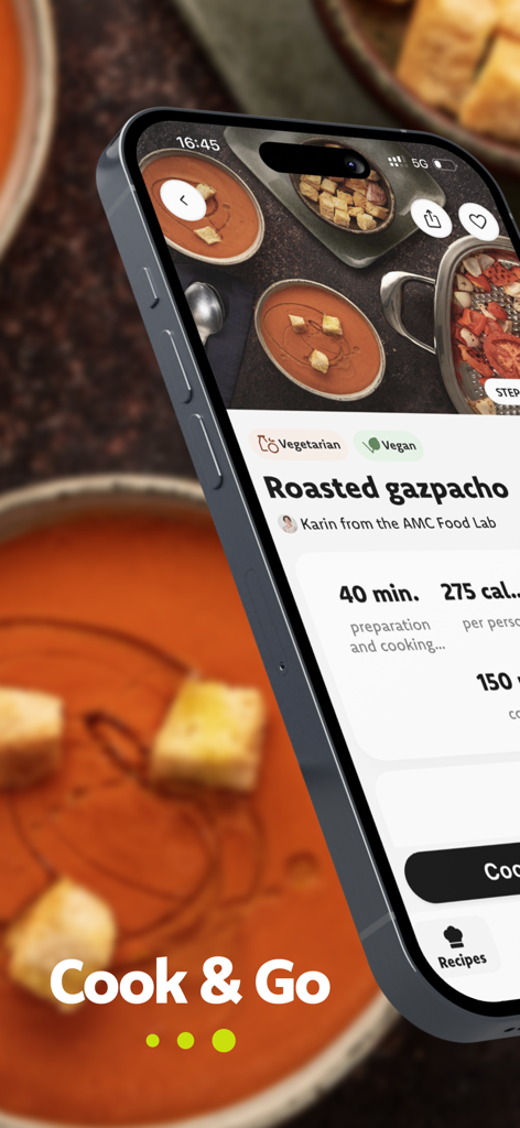AbyAMC Cook & Go - Smartphone displaying a roasted gazpacho recipe on the AbyAMC Cook and Go app with cooking time and calorie details