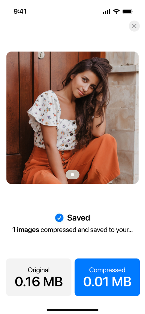 0.16MBの写真を0.01MBに正常に圧縮し、保存確認が表示されたアプリ画面