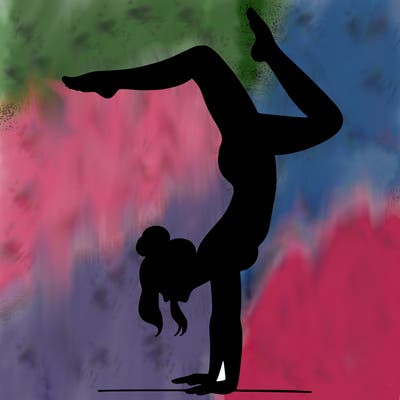a woman doing a handstand