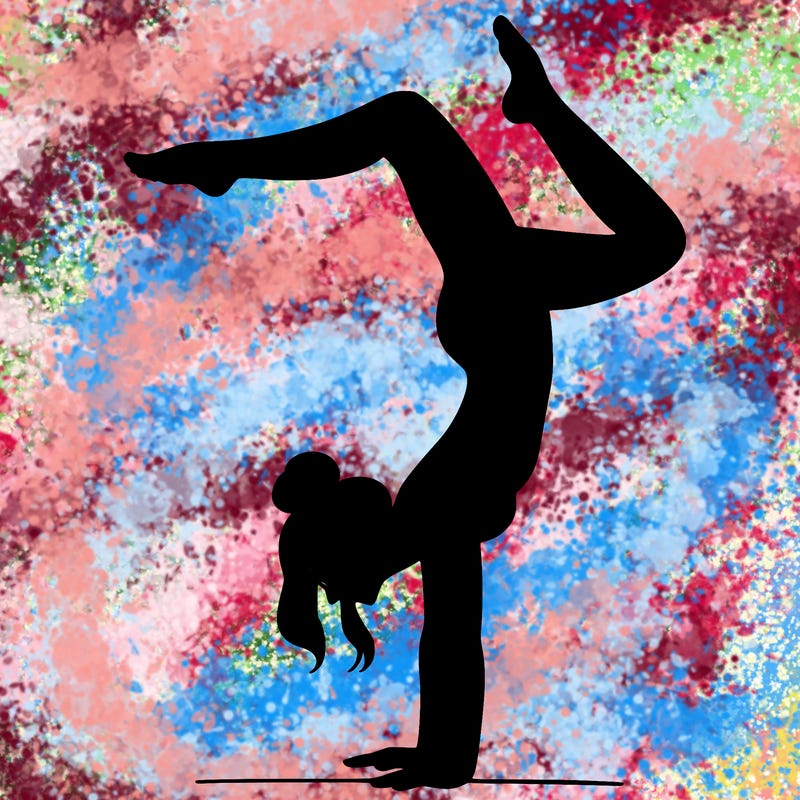 a woman doing a handstand