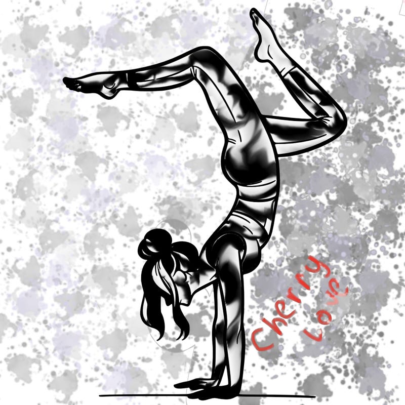 a woman doing a handstand