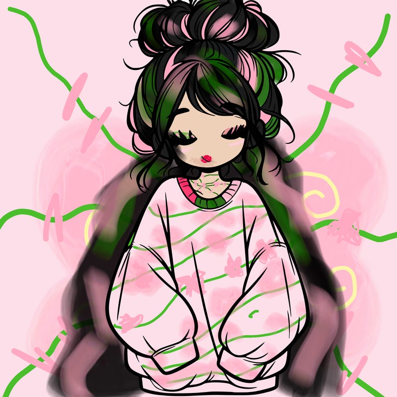 girl with baggy sweatshirt and messy bun