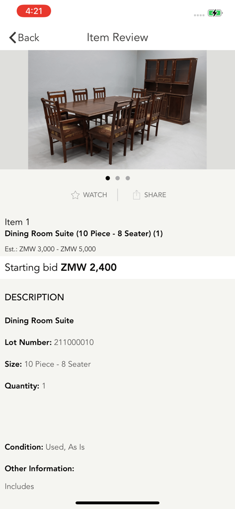 Mobile app screen showing an auction listing for a ten piece dining room suite