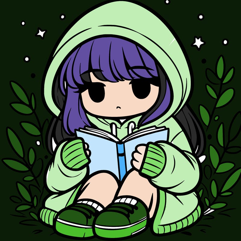 girl in oversized hoodie reading a book