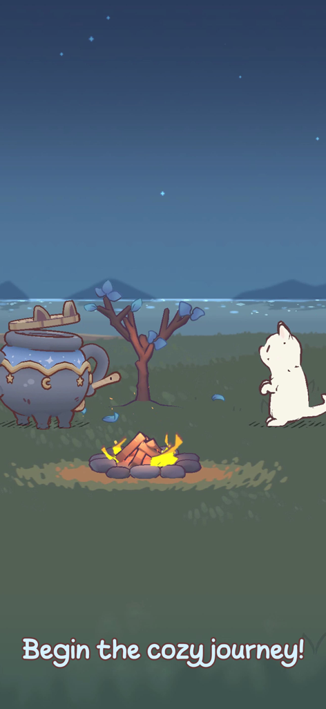 可愛い白い猫が、夜に焚き火と魔法の大釜の近くに立っており、「居心地の良い旅を始めましょう」というテキストが表示されている。