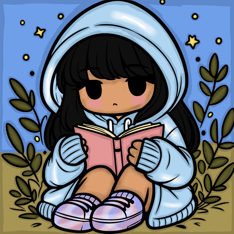 girl in oversized hoodie reading a book