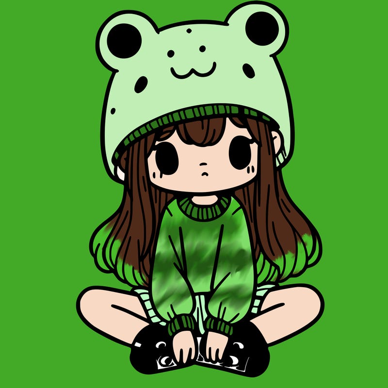a girl wearing a frog hat and some frog socks