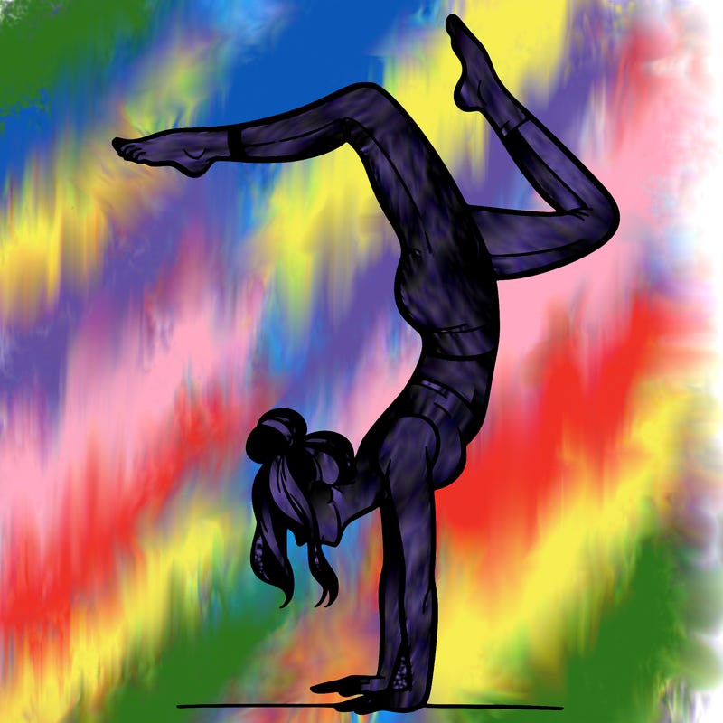 a woman doing a handstand