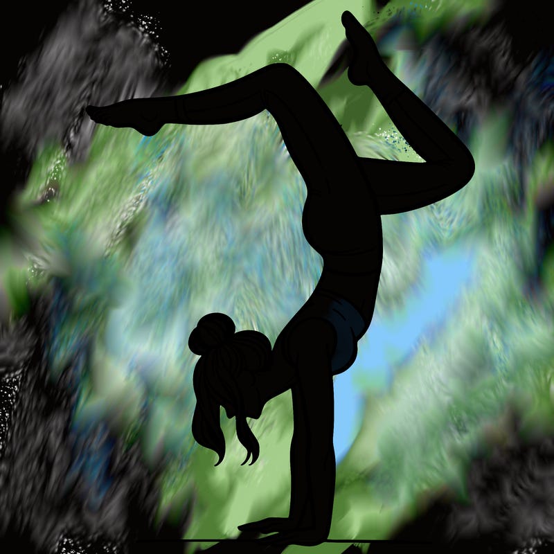 a woman doing a handstand