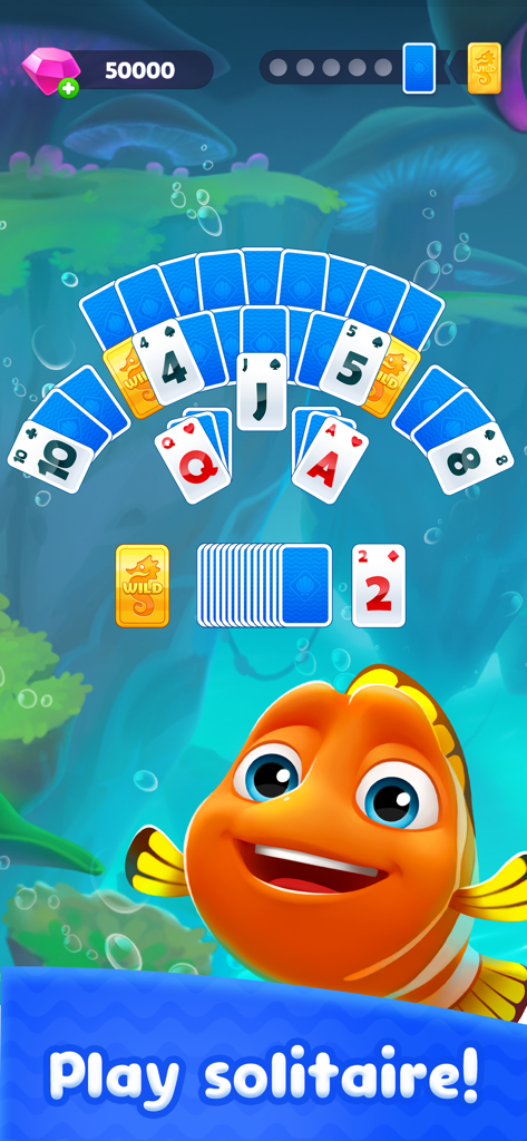 Fishdom Solitaire - Jugabilidad de Fishdom Solitaire con un pez naranja sonriente y puzles de cartas en un mundo submarino.