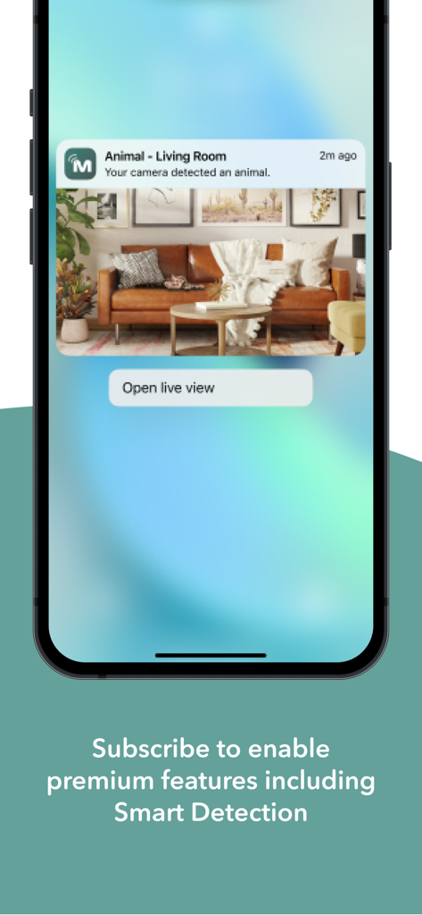 Smartphone screen showing a Merkury Smart app notification for animal detection in a living room with a camera preview.