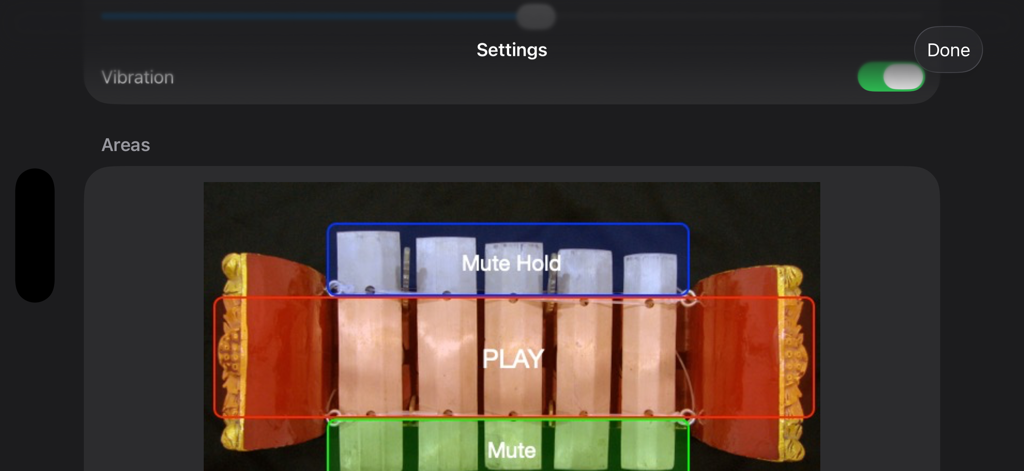 Gangsa - A diagram of the Gangsa instrument highlighting the specific touch zones for playing muting and holding sounds