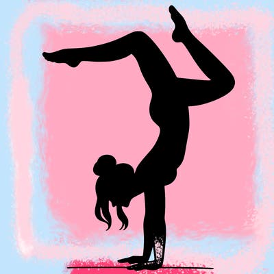a woman doing a handstand