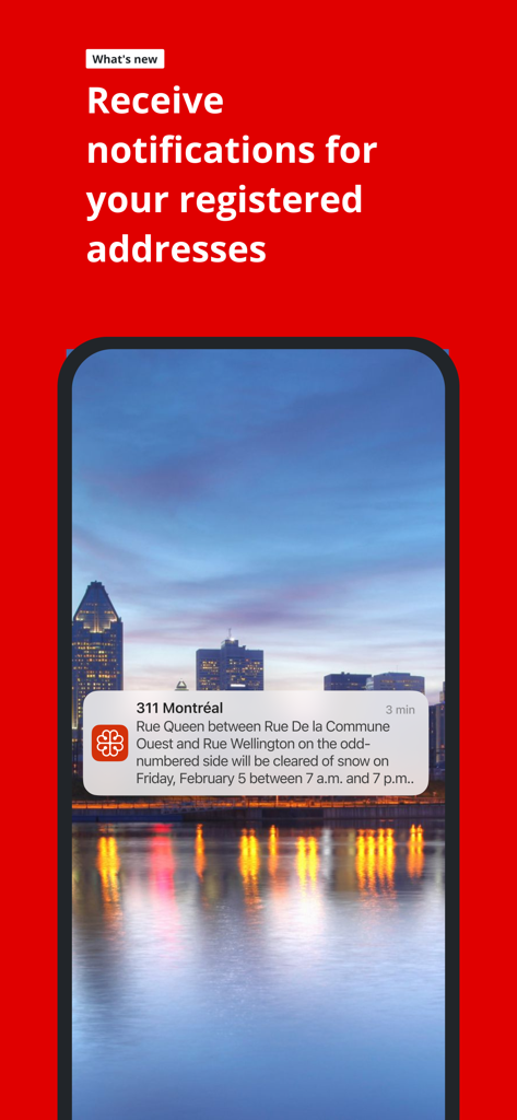 Smartphone screen showing a 311 Montreal push notification alert for snow removal on a specific city street.