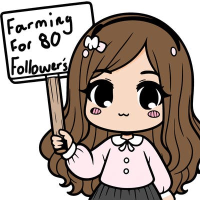 a girl holding a sign