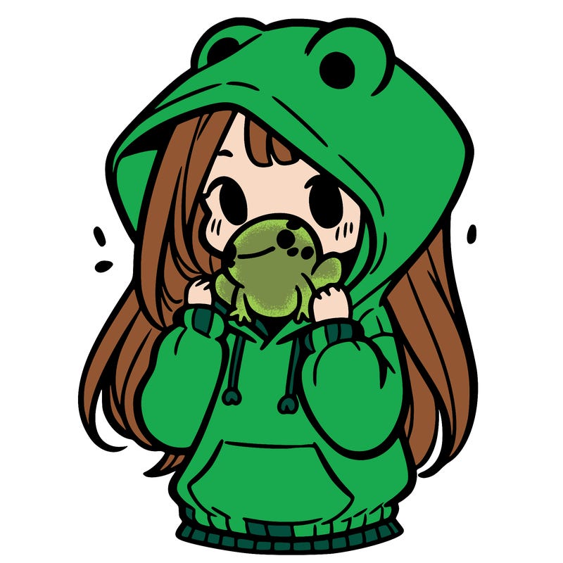 a girl holding a froggy hoodie