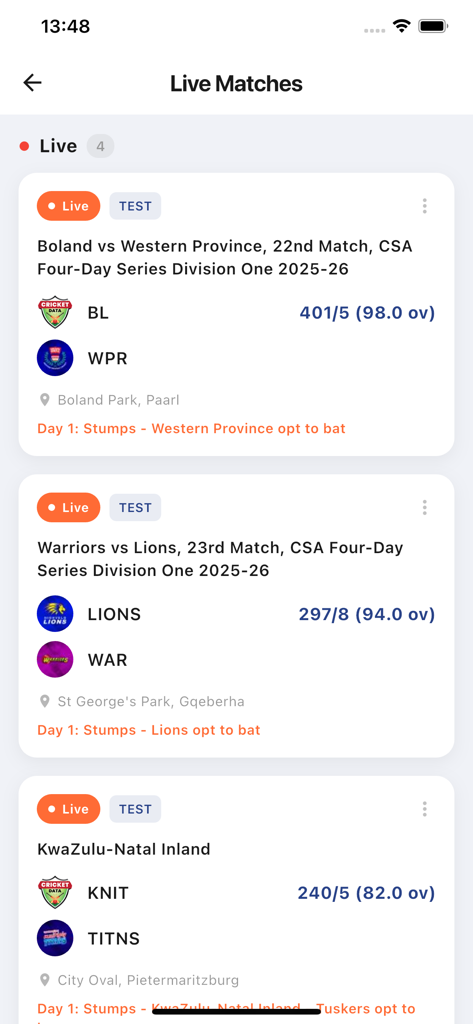 Interface of the CricTV app showing a list of live cricket matches with team names, logos, and current scores