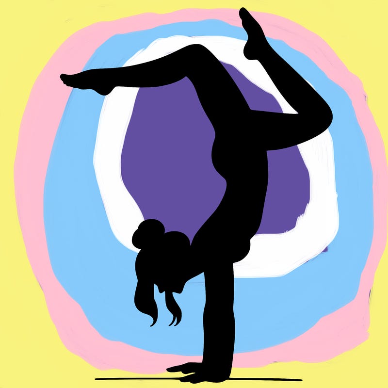 a woman doing a handstand