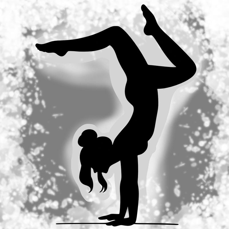 a woman doing a handstand