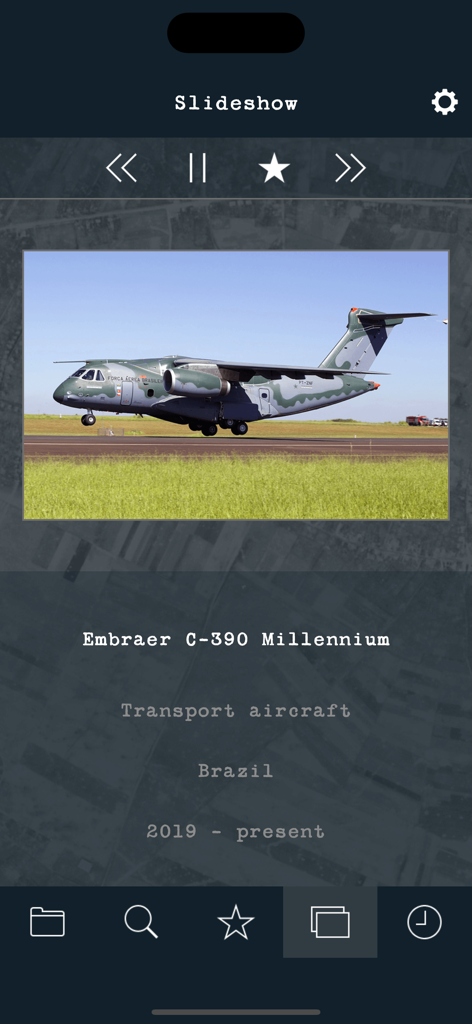Slideshow screen featuring an Embraer C-390 Millennium transport aircraft from Brazil