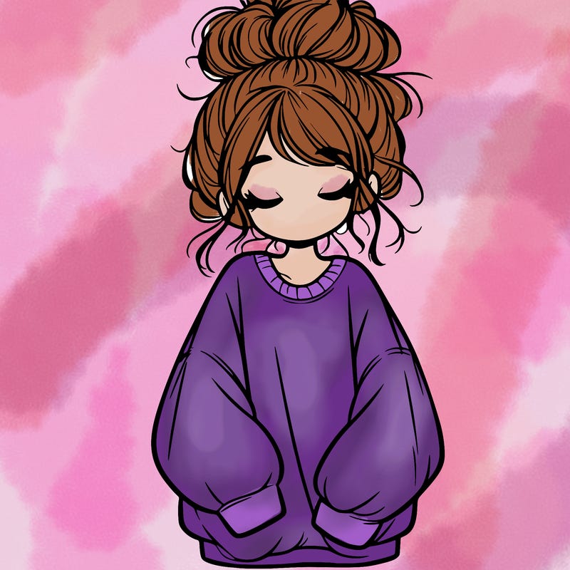 girl with baggy sweatshirt and messy bun