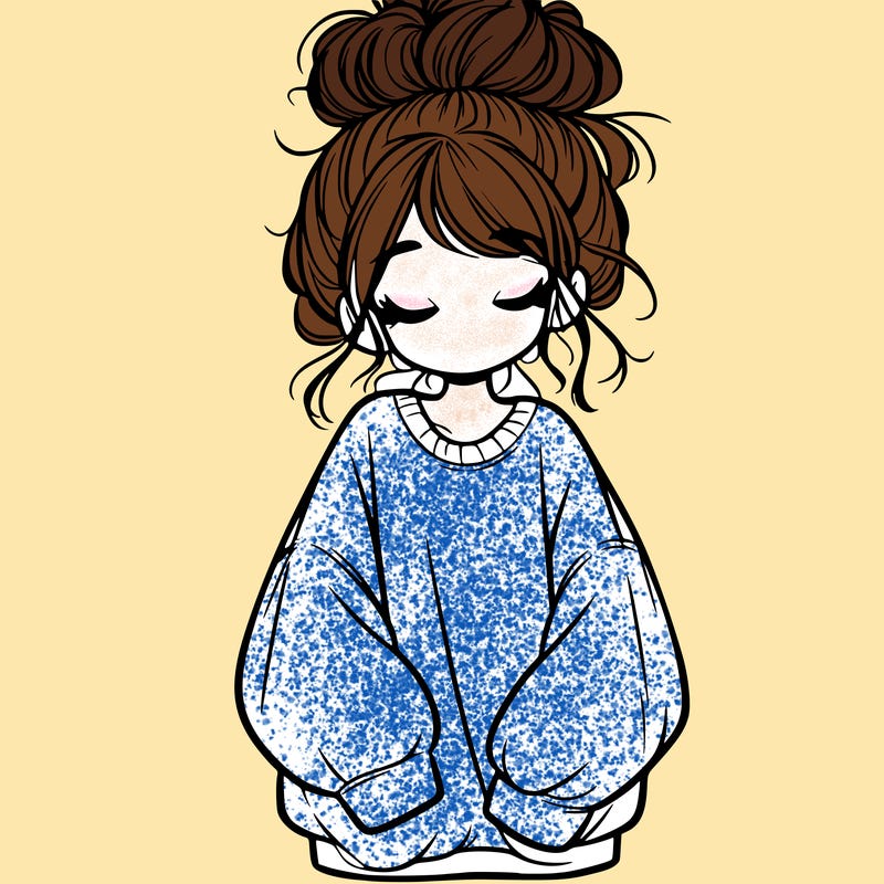 girl with baggy sweatshirt and messy bun