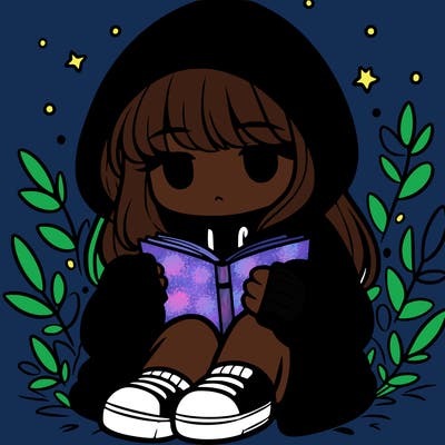 girl in oversized hoodie reading a book