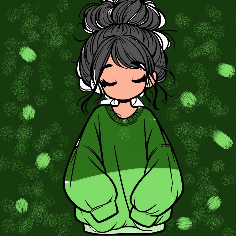 girl with baggy sweatshirt and messy bun