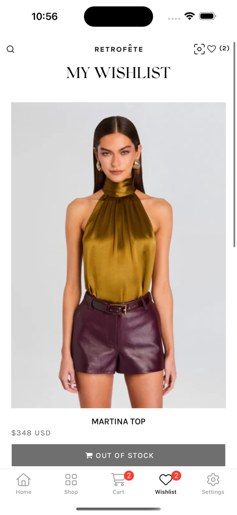 A wishlist view in the Retrofete app showing a gold silk Martina top on a model with an out of stock button