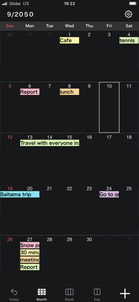 Monthly calendar interface of the N Calendar app featuring color coded events and a minimalist dark mode design