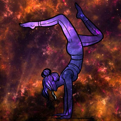 a woman doing a handstand