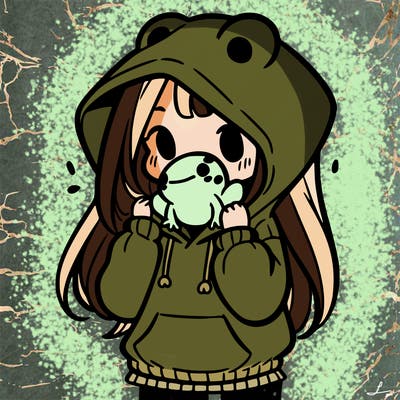 a girl holding a froggy hoodie