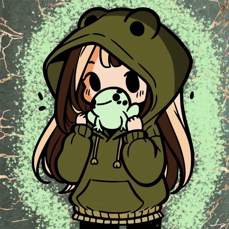a girl holding a froggy hoodie