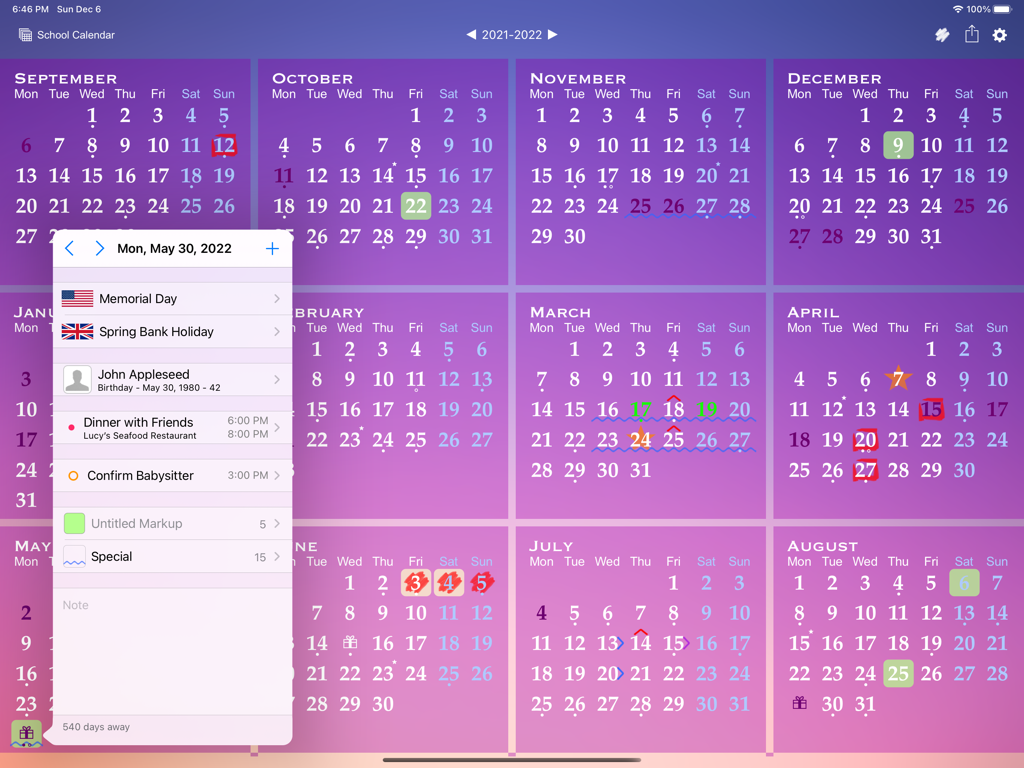 All-in-One Year Calendar Pro - Full year calendar view on an iPad featuring a detailed day event popup and color coded markups.