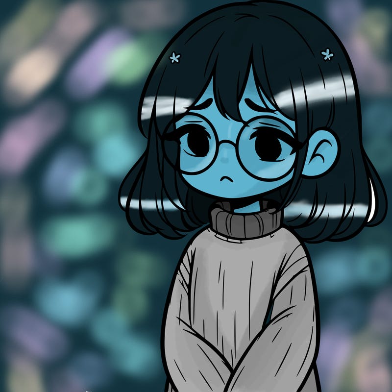 sad girl with glasses in a sweater