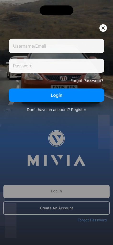 MIVIA 2.0 - Écran de connexion et d'inscription de l'application MIVIA 2.0 avec une voiture de sport sur fond de route pittoresque.