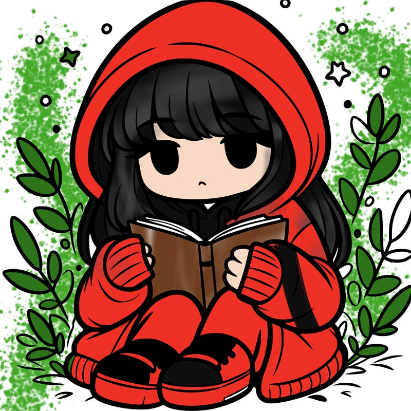 girl in oversized hoodie reading a book