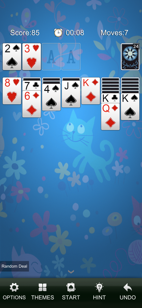 Solitaire - Klondike Games - Juego de Solitario Klondike clásico con cartas grandes sobre un fondo azul con patrones de gatos y flores.