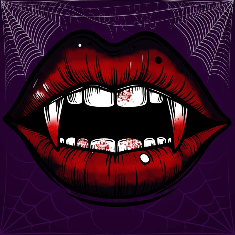 lips with vampire teeth