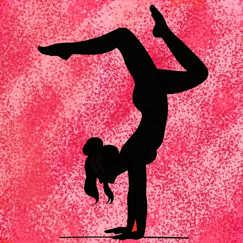 a woman doing a handstand