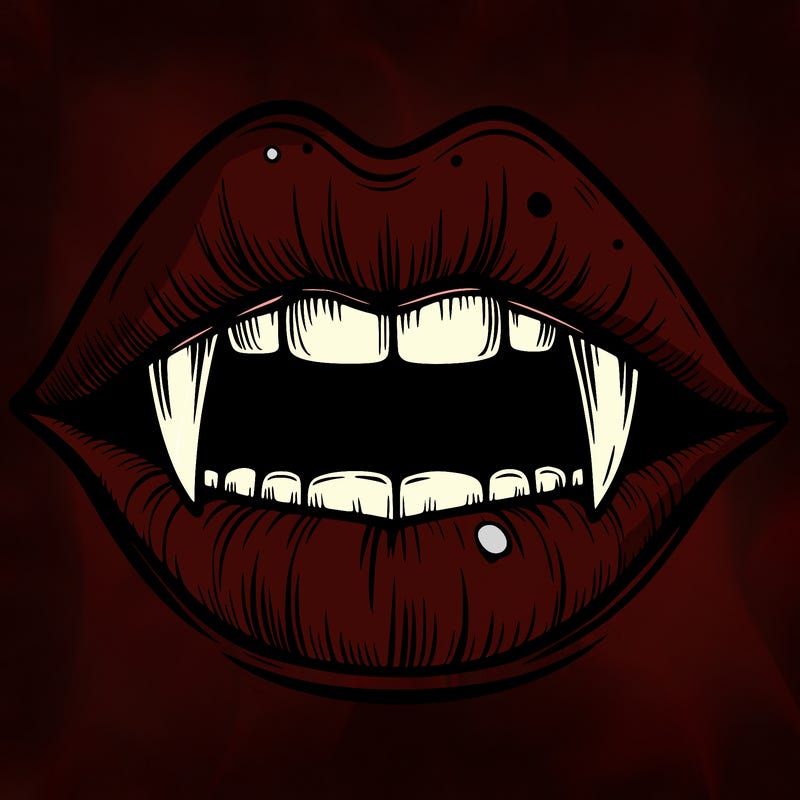 lips with vampire teeth