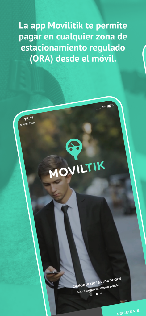 A young professional using the Moviltik mobile app on his smartphone to pay for regulated city parking