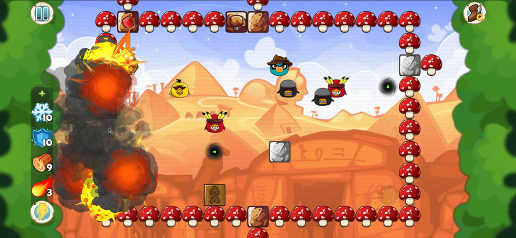 폭발 효과가 있는 이집트 사막 배경의 스파이 돼지와 사악한 닭이 나오는 '헝그리 피기 vs 치킨'의 게임 플레이 스크린샷