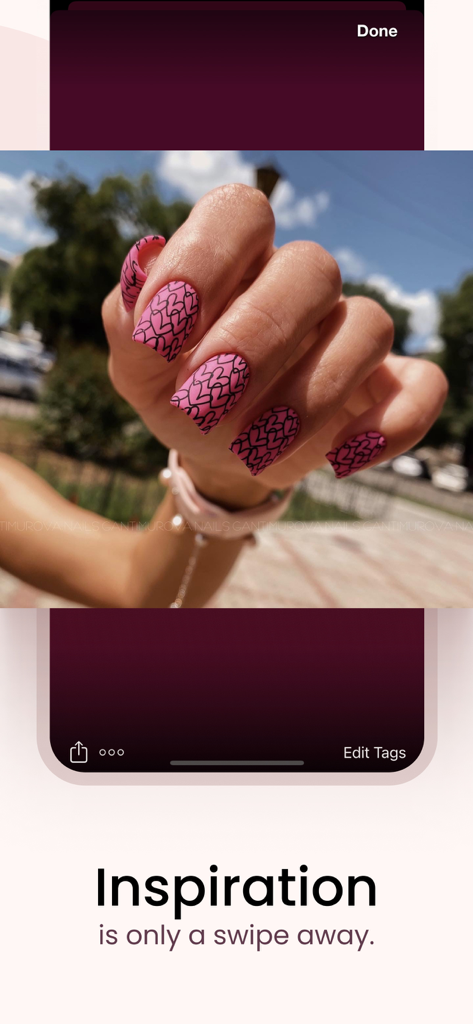 Styles4Nailz – Nail Designs - Close up of pink nails with black heart patterns featured in the Styles4Nailz app
